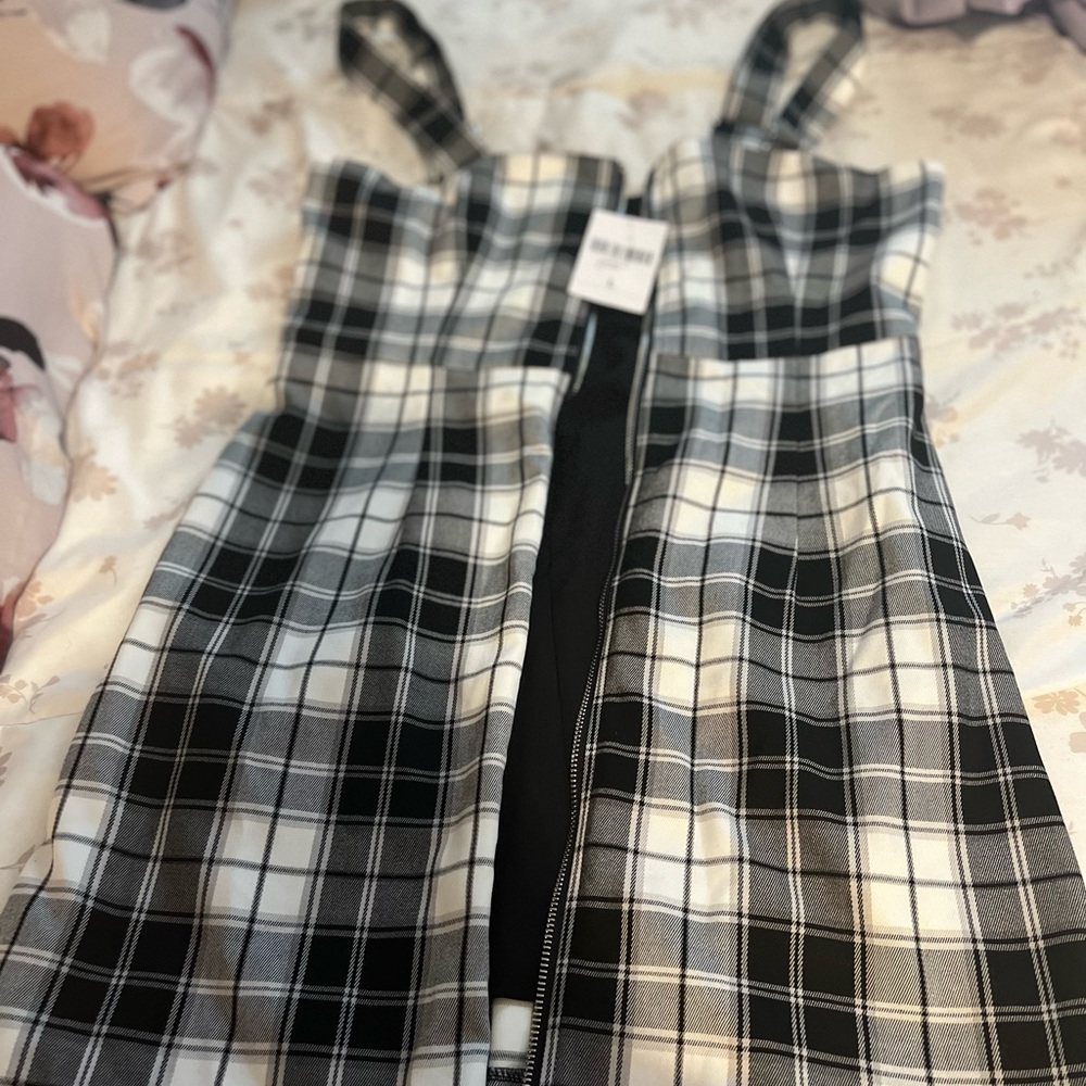 A plaid black and white dress